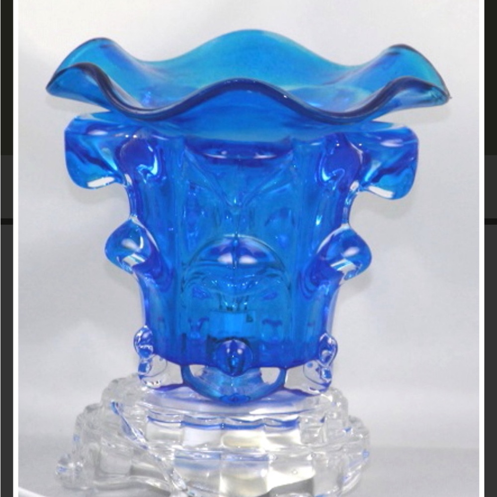 Blue oil warmer